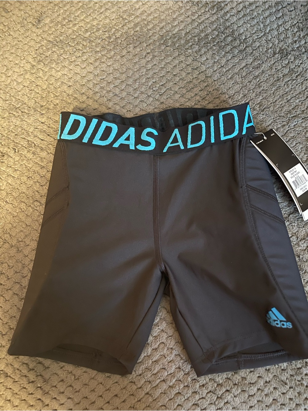 2 pair of girls adidas Kids slider Shorts with Teal Logo Waistband
